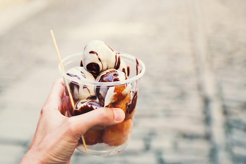 little doughnuts balls) with chocolate - famous Croatian dessert 